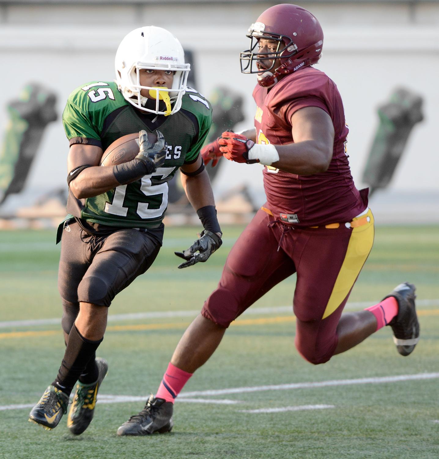 East los Angeles College sophomore running back Shaquille Shelton, No. 15, looks ahead after getting by a Victor Valley College defensive player in an almost two-quarter scrimmage between both schools on August 25 at Weingart Stadium. (Photo by Tadzio Garcia)