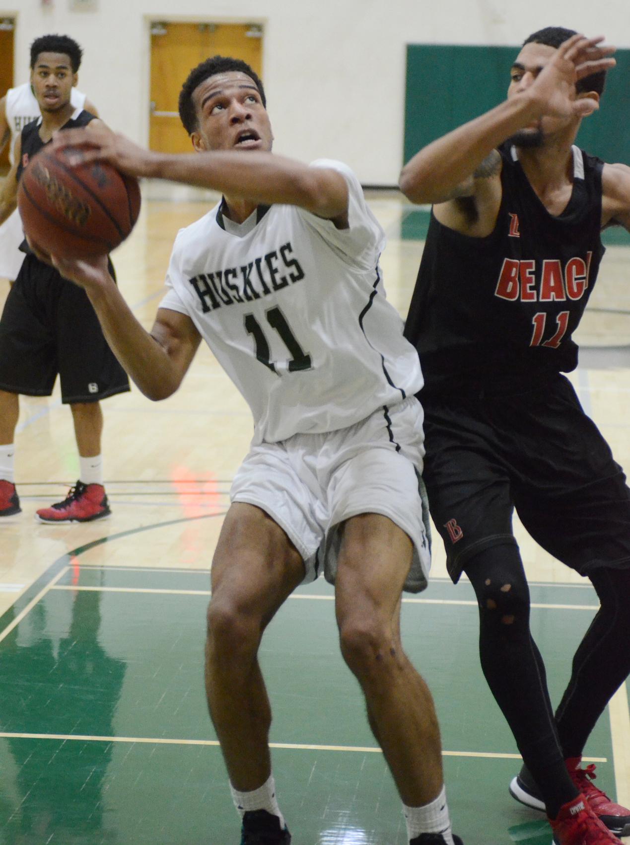 East Los Angeles College freshman forward Zeno Lake attempts a layup in a 105-82 non-conference divisional crossover win against Long Beach City College on Jan. 8. (Photo courtesy of Mario Villegas)