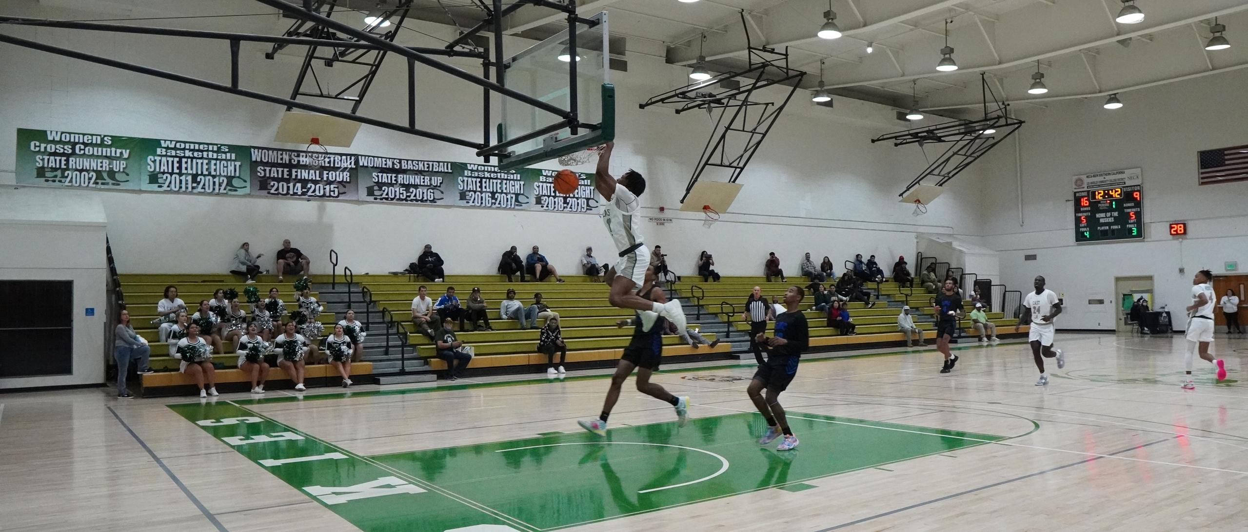 Sanders Pours in 20 as Huskies Control Corsairs 84-60 in Home Opener