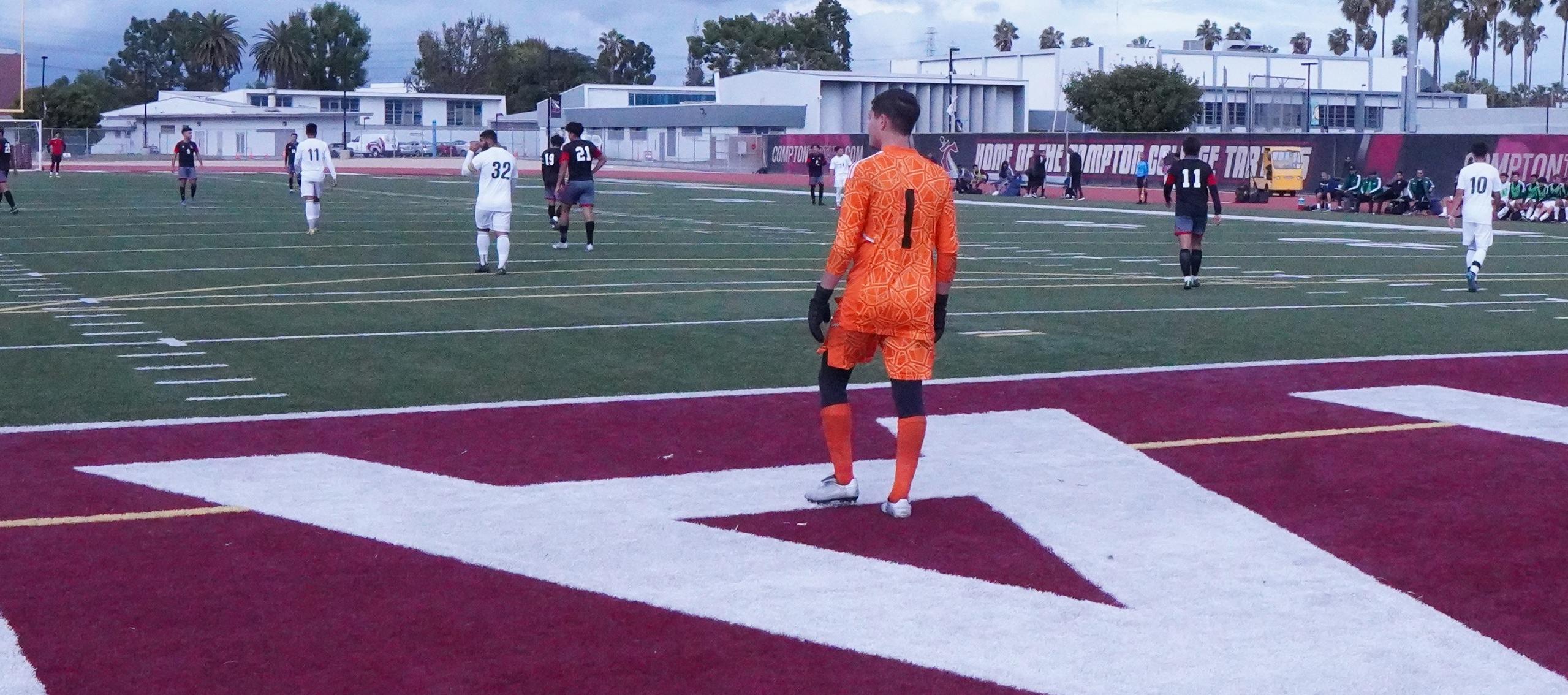 Huskies Persevere Through Stormy Downpour to Beat Compton, Likely Clinch State Playoff Spot