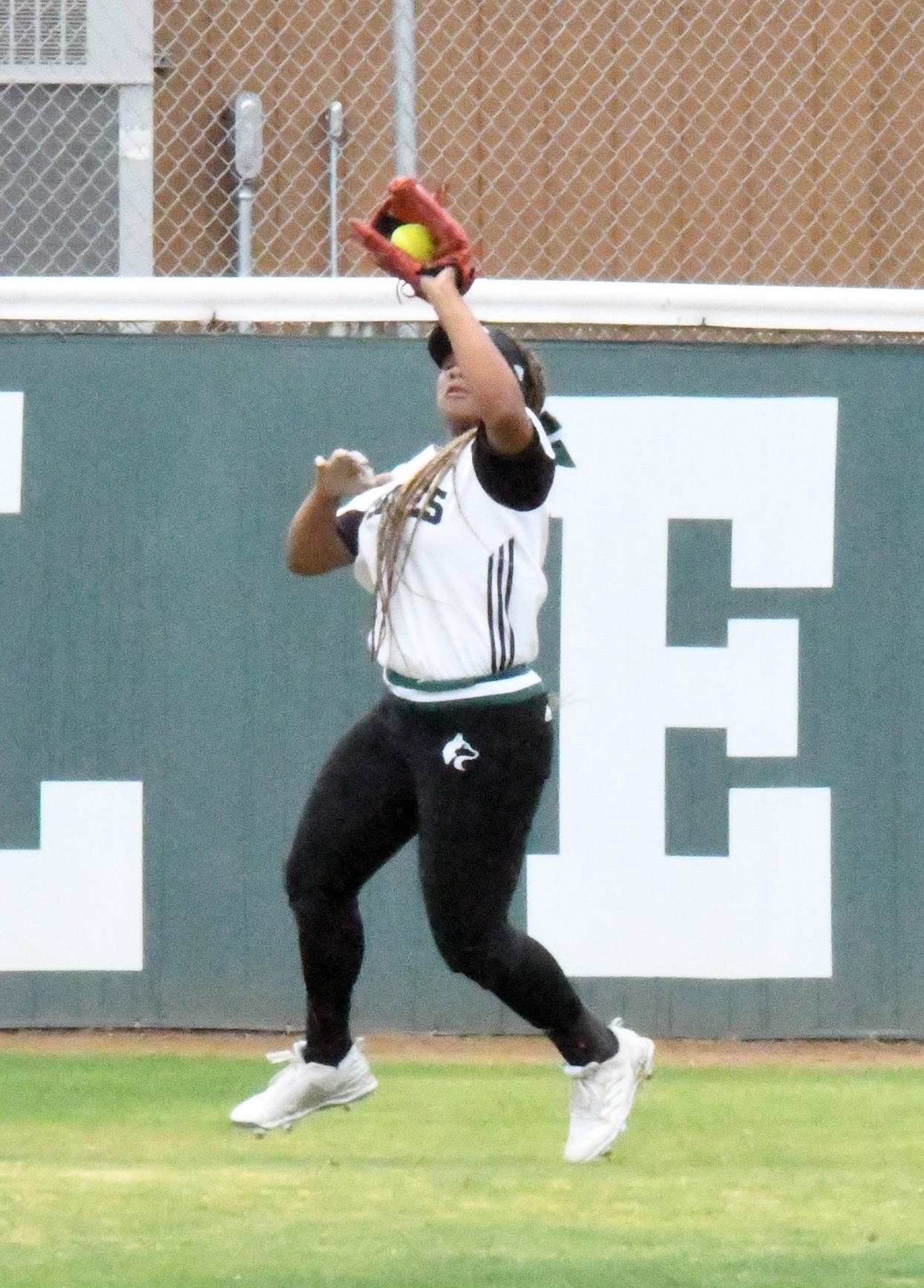 Center fielder Mon&egrave;t Manning was 3-for-3 today in a 6-3 upset win over powerhouse Santa Ana College. The Huskies scored 3 runs in the bottom of the 6th. Manning doubled and singled twice. (photo by DeeDee Jackson)
