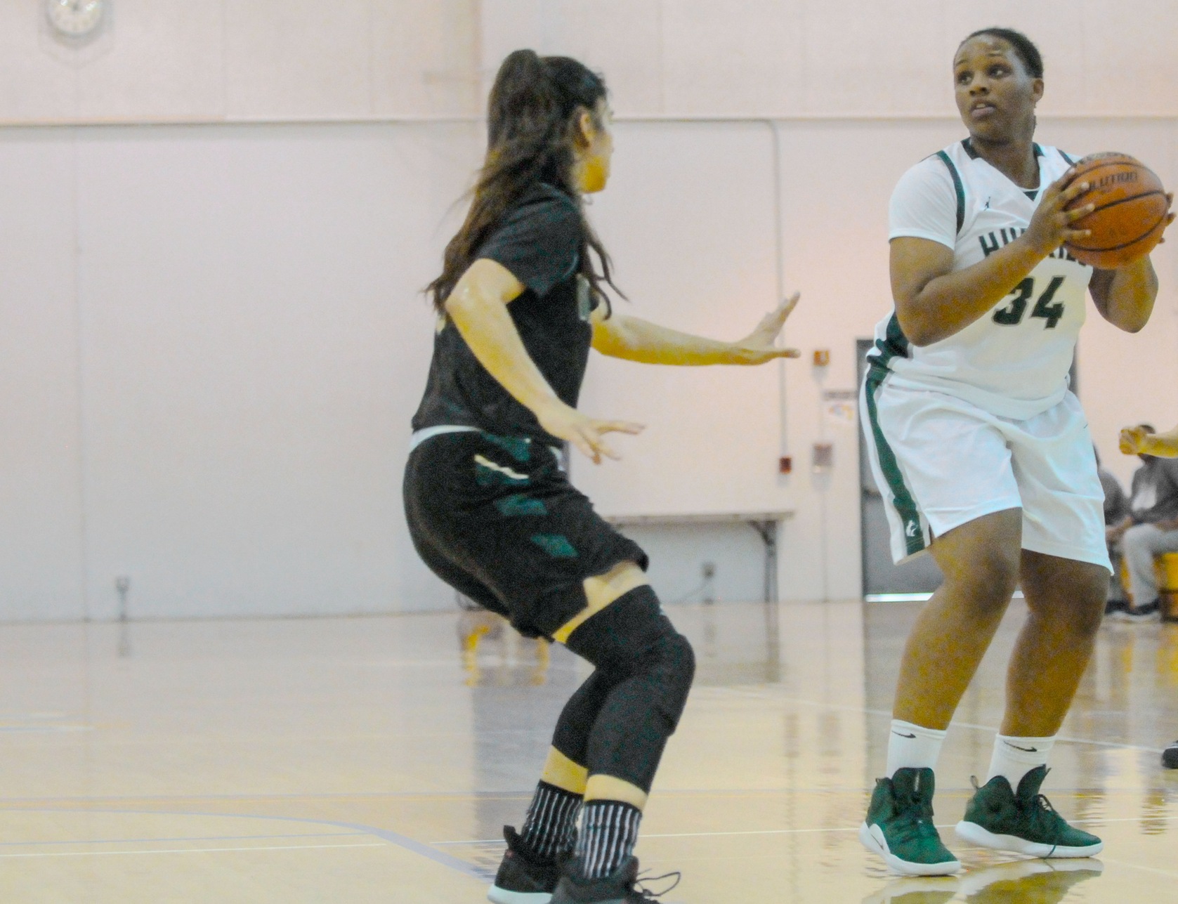 East L.A. College guard Dominique Godbolt, who had a double double, eyes the basketball in a 79-71 win vs. Riverside City College at Palomar College at the Dome. (Photo by Tadzio Garcia)