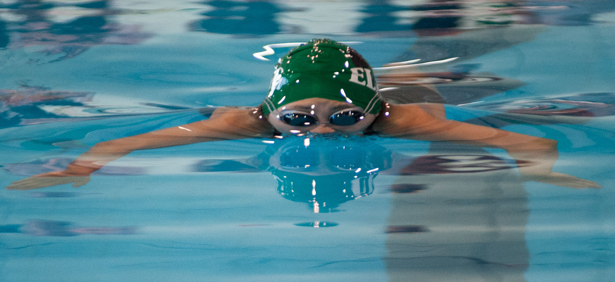 LOOKING AHEAD -- Yingfei Alice Zhang competes in the 100-yard individual medley in the 2014 CCCAA State Championships earning National All-American in the process. (Photo by Tadzio Garcia)