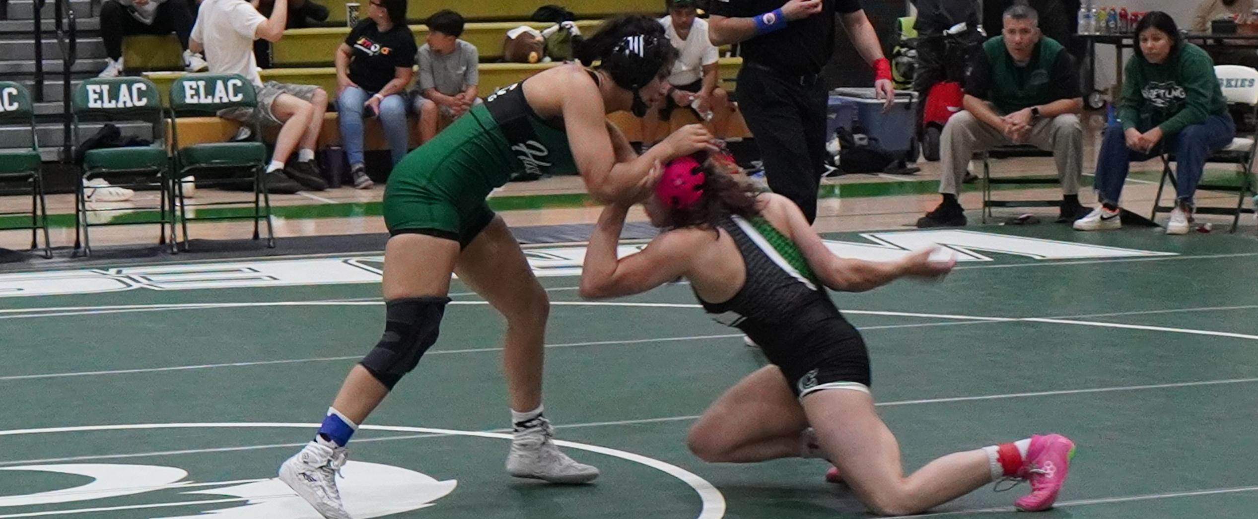 Huskies Sweep Pair of Tight Duals at Quad Meet
